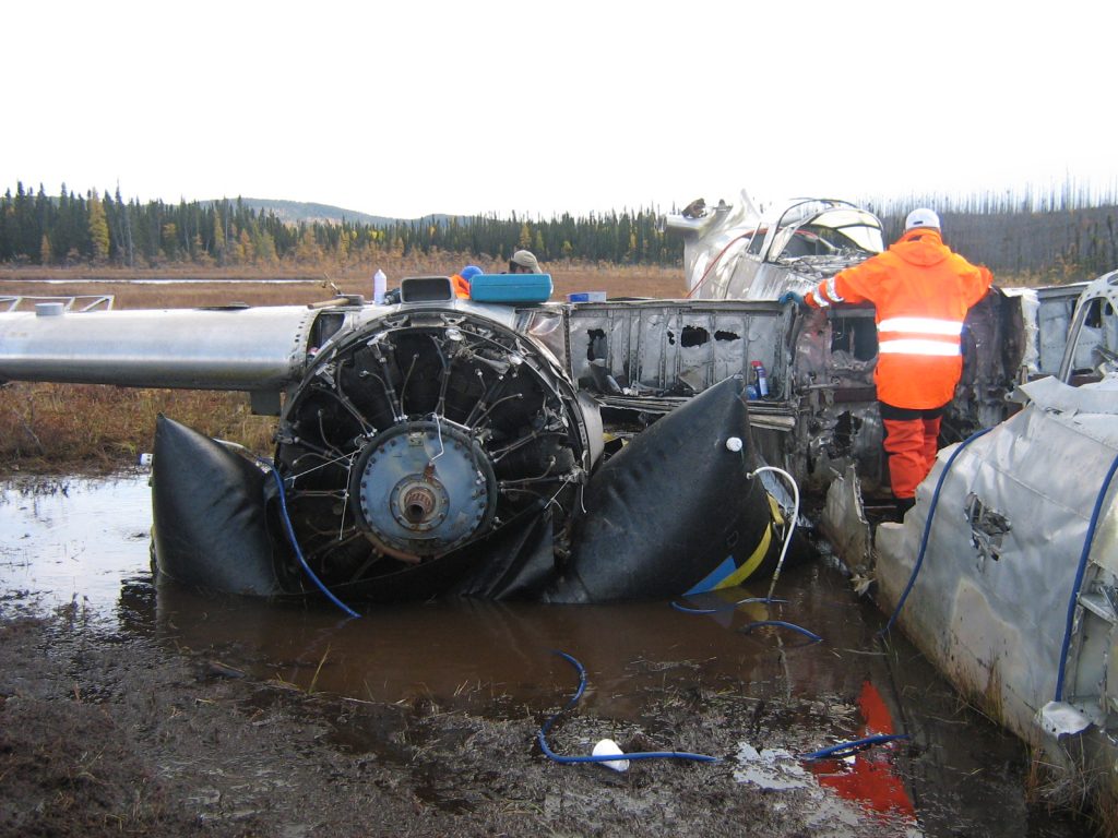 Airbags lifting aircraft out of marsh