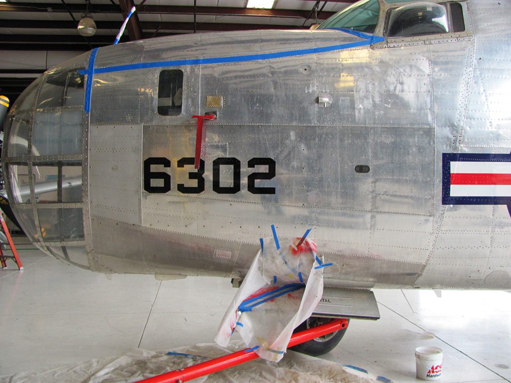 pb4y-2-6-nose-section-painting-the-tow-limits-on-the-nose-gear-doors-and-preparing-to-paint-the-glare-shield