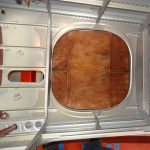 Wood portion of access door on belly of fuselage